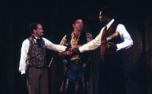 The Host of the Garter (Dan McLeary) has Dr. Caius (Mark Rector) and Sir Hugh Evans (Johnny Lee Davenport) make up after they learn they have been duped into dueling. (PHOTO: Orlando-UCF Shakespeare Festival)