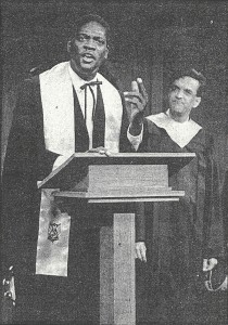As Purlie Victorious, preaching before a congregation as Charlie (Lance Gharavi) looks on (PHOTO: Courtesy of E. Randahl Hoey)