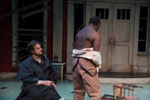 As Simon, revealing to Caleb (Jesse Hinson) that he too was subject to Mr. DeLeon's wrath and the Whipping Man's cruelty (PHOTO: Andrew Brilliant)