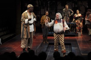 As Poins, a thief (and, in this production, a spy), threatening Sir John Falstaff (Malcolm Ingram) as Peter (Alexander Sovronsky) and look on (PHOTO: Kevin Sprague)